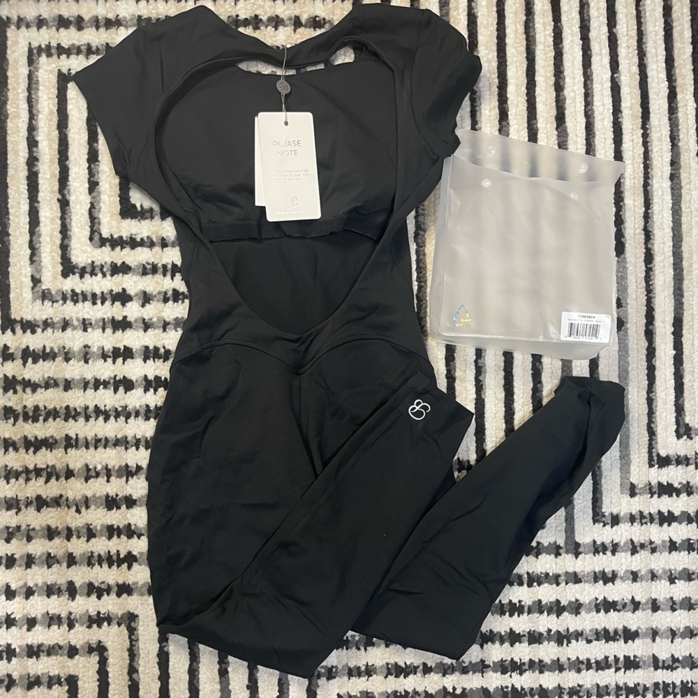 Bombshell Sportswear open back tee bodysuit in black size LARGE NWT